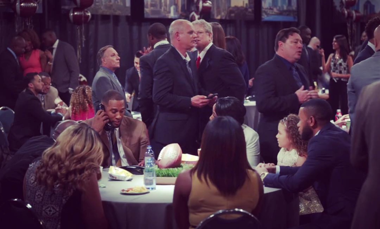 User-supplied Ballers television scene still from a banquet setting